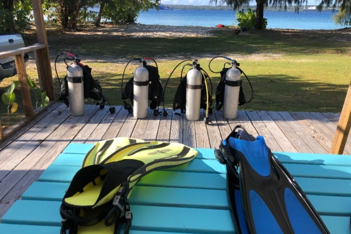 a boat sitting on top of a picnic table